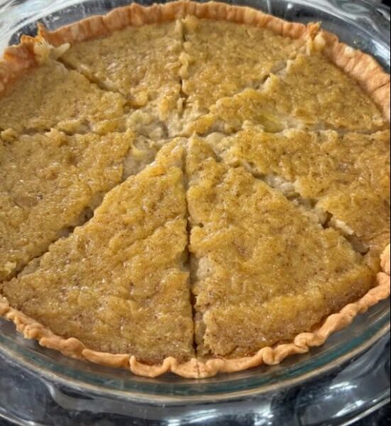 Homemade New England Marlborough Pie with a golden apple custard filling baked in a flaky pastry crust.
